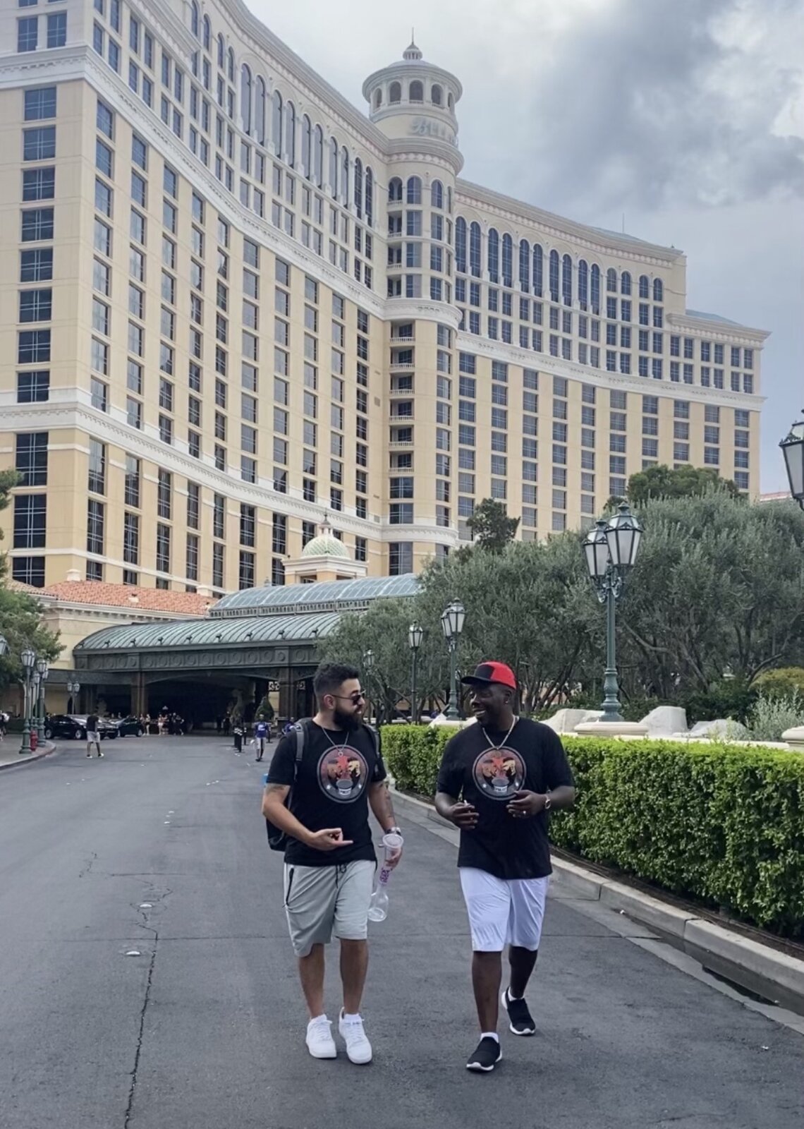 JJ Salomon and Karray 'Mr. IOTBA' Bradshaw, co-founders of The Spit Bucket, walking past the Bellagio in Las Vegas
